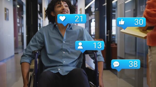 Man in wheelchair rolling down hall as blue bubble appearing social likes rising beside him smiling