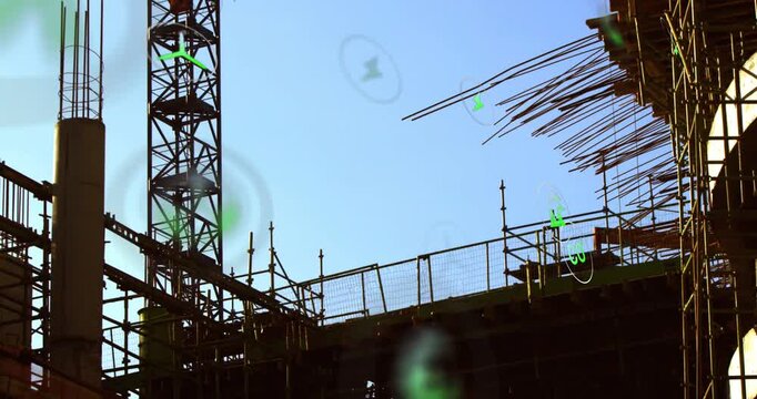 Vertical video: Walking site workers inspecting deck on high-rise, crane rebar HUD icons appearing