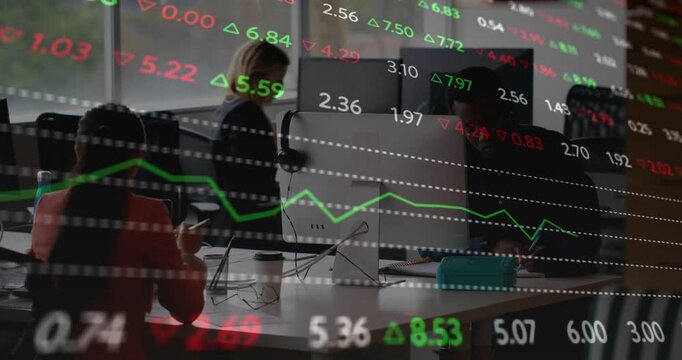 Vertical video: Team watching monitors in finance, reacting to live ticker update to catch trades