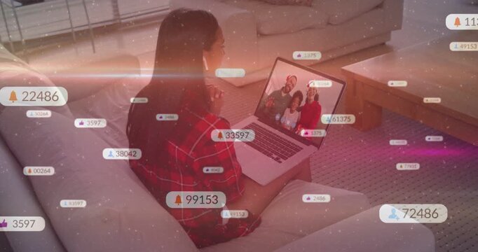Woman viewing laptop on sofa, badges appearing and drifting, call showing tech counts with family