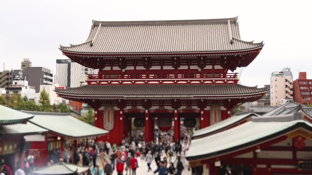 Senso-Ji temple in Asakusa district,  Taito City, Tokyo, Japan, Asakusa Kannon, Kinryu-zan Buddhist temple shrine in autumn fall day, with Nakamise shopping street, Kaminarimon Gate and Hozomon gate