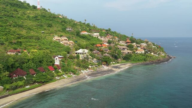 Aerial view of amed coastline with traditional fishing boats