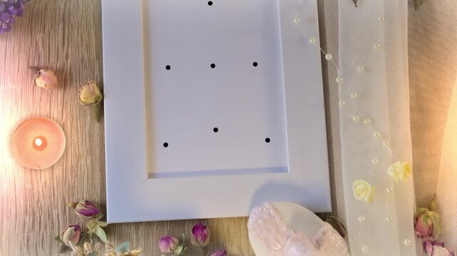 Wedding photo frame mockup with 9 tracking markers on wooden table with candles and flowers for easy motion tracking