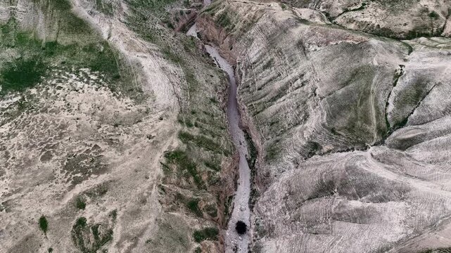 Aerial Darga Canyon Judean Desert Dramatic Landscape Israel

Drone footage of Darga canyon cliffs and desert valleys Israel March 16 2026 landscape
