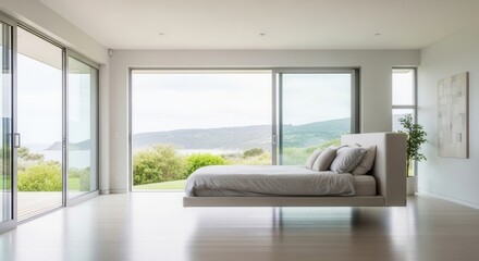 Fototapeta premium Minimalist Bedroom With Panoramic Ocean Views And Lush Greenery