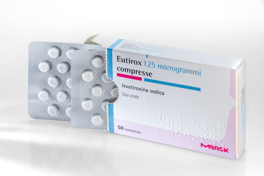 Italy - March 24, 2026: Eutirox 125 micrograms Levothyroxine Sodium, synthetic thyroid hormone, medication used to treat hypothyroidism. Cardboard box containing blister-packed tablets