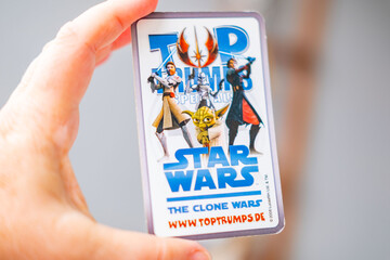 Fototapeta premium Star Wars Force Attax strategic trading cards by Topps , variety collectible gaming cards featuring movie characters, hobby activity and entertainment, playing Nostalgic and modern entertainment