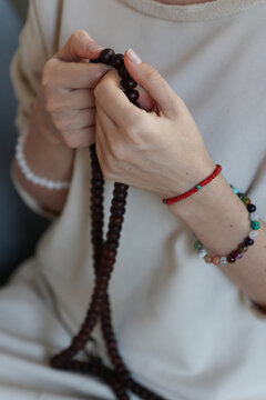Woman Practicing Mindfulness Meditation with Bodhi Wood Mala Beads