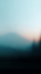 Fototapeta premium Blurred nature landscape background with calm sunset atmosphere