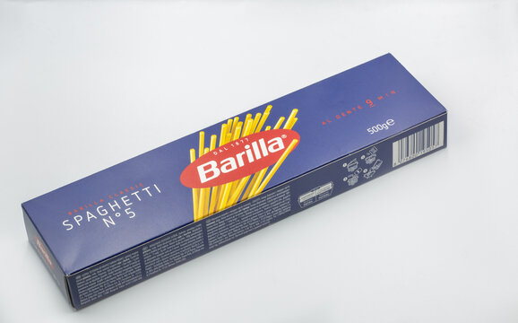 Barilla spaghetti number five Italian pasta closeup on white.