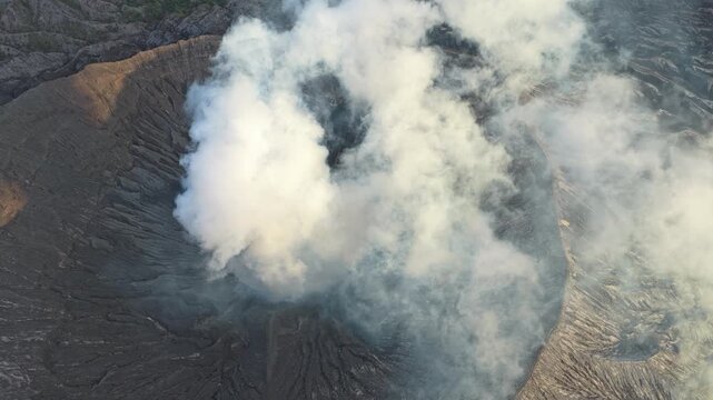 Smoking crater of mount bromo volcano aerial view