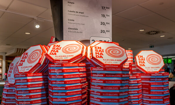 Ensaimada Pastry Boxes with Price Menu Display at Airport Shop in Palma Spain.