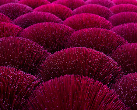 Closeup of dry purple incense sticks in a craft village in Vietnam
