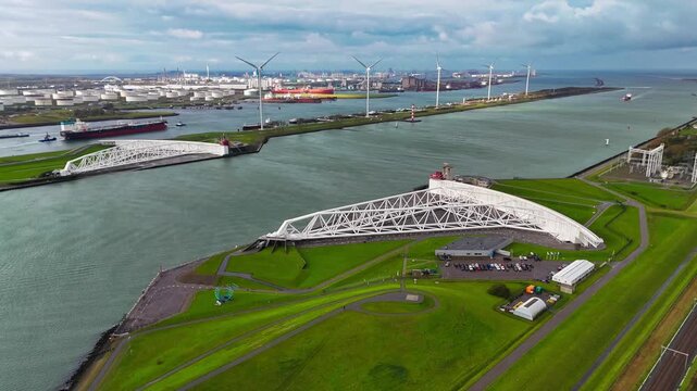 The Maeslantkering, or Maeslant barrier, is a storm barrier in the Rhine Delta in the Netherlands for flood protection. It is one of the largest moving structures on Earth. High quality 4k footage