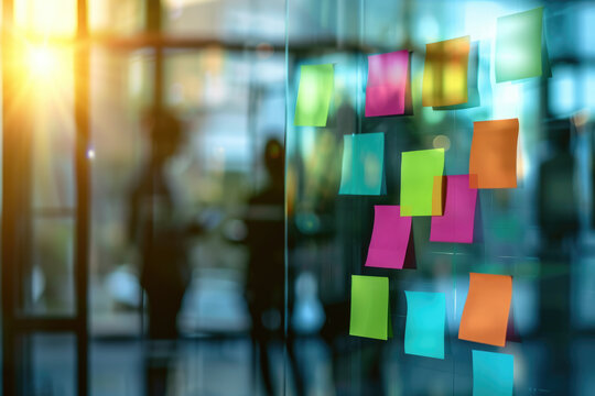 creative ideas concept picture of glowing light bulb with sticky note from teamwork on brainstorming board background.	