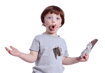 Worried little boy stained t-shirt with chocolate on white background