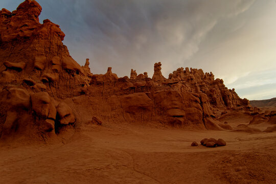 Expansive Red Hoodoos Amid Rugged Utah Terrain Perfect For Geological Exploration And Photography