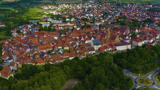 Panorama aerial view of the old town city Volkach in Germany  on a cloudy day in spring.