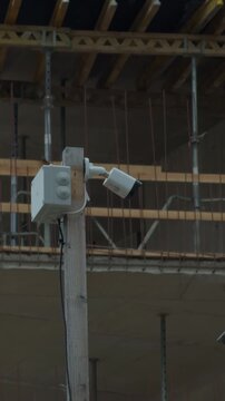 Vertical mounted device captures detailed facade work and urban renewal actions remotely for construction teams