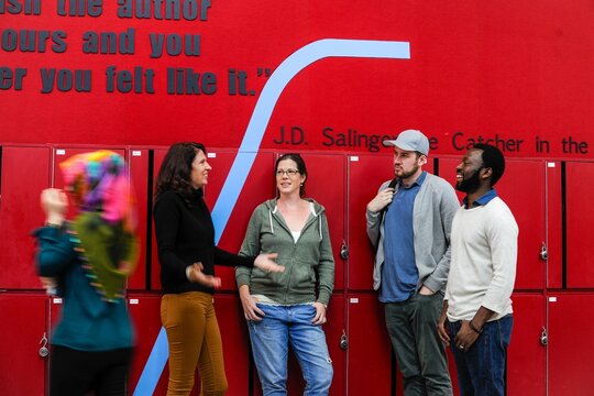 Group discussing in front lockers