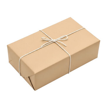 Small brown paper gift box wrapped with white string and bow, isolated on transparent cutout png.
