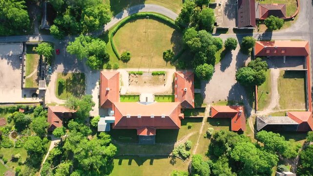 Aerial 4K video from a drone to Suuremoisa baroque manor ensemble in Estonia.  Hiiumaa, Estonia, baltic.