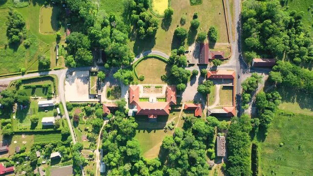 Aerial 4K video from a drone to Suuremoisa baroque manor ensemble in Estonia.  Hiiumaa, Estonia, baltic.