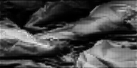 Fototapeta premium Halftone crumpled paper texture with a dotted, rough, and wrinkled surface. Black creased sheet background in comic pop-art style, featuring grainy folds and gritty distressed details.