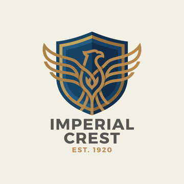 A sophisticated logo depicting a phoenix rising with elegant wings, symbolizing strength, renewal, and heritage, established in 1920, ideal for luxurious brands or establishments.