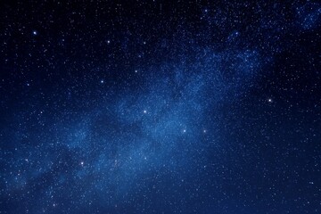 Fototapeta premium Stunning view of the night sky filled with countless stars and a cosmic blue backdrop, showcasing the vastness and beauty of space and the universe
