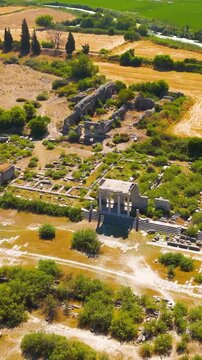 Vertical video. Balat, Turkey. Aerial drone view of the ruins of Miletus, birthplace of philosophers Thales and Anaximander, showing the city's ancient grid plan. Aerial View, MasterShots, Rocket. Ri
