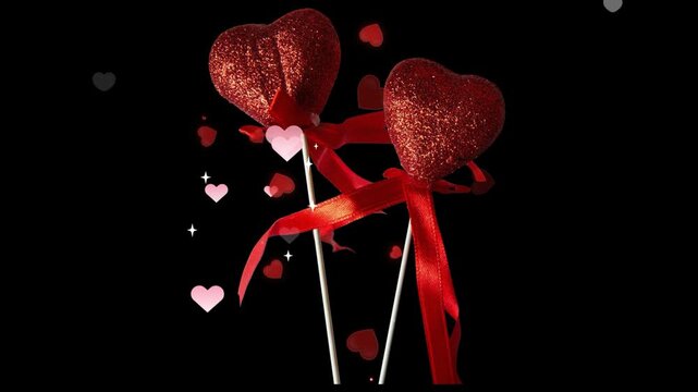 Valentine's day love hearts on sticks with glitter and ribbons, romantic celebration, bokeh lights background, heart shape
