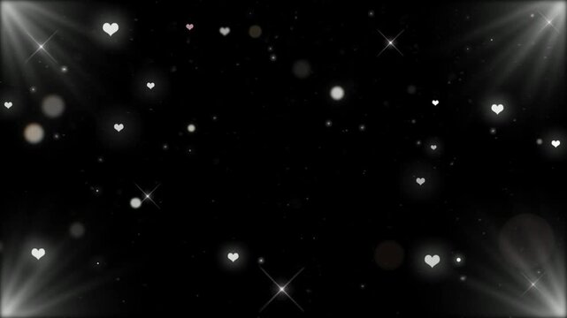 Sparkling particles and light flares on dark background, abstract overlay, black background