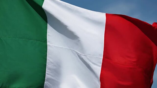A national flag with vertical stripes of green, white and red