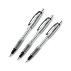 Fototapeta premium Three sleek retractable ballpoint pens with clear barrels and metallic accents on white background