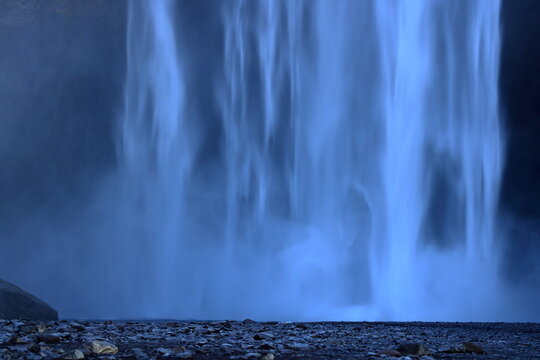 Skogafoss, with trail to an observation platform above it in south Iceland 