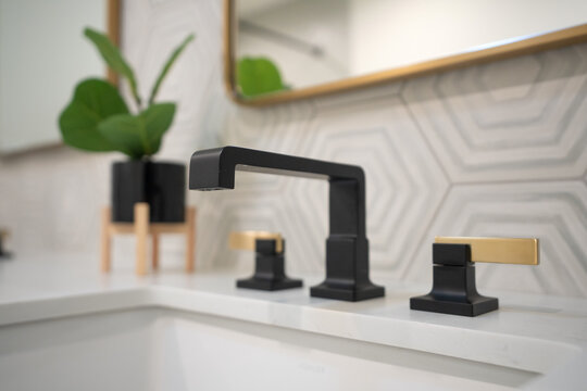 Modern Black and Brass Bathroom Faucet with Geometric Tile Backsplash, Luxury Bathroom Fixture Design