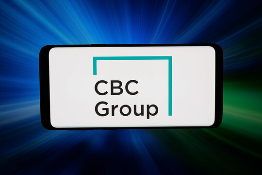 Stuttgart, Germany - 03-19-2026: In this photo illustration, the logo of Singaporean investment company CBC Group is displayed on a smartphone in front of abstract background on computer screen.