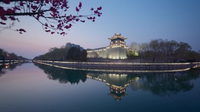Night View of the Illuminated Zuoanmen Corner Tower Library and Plum Blossoms by the Moat, Beijing