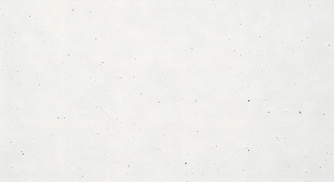 A pale off white paper or light cardboard surface with subtle speckles and natural grain
