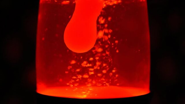 Red Lava Lamp with Glowing Liquid Motion.
