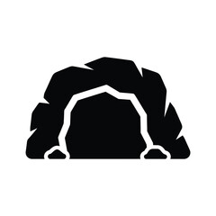 Black silhouette of a rocky mountain with cave entrance © dipu