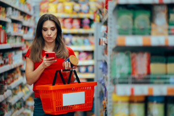 Woman Checking Product Ingredients on the Internet. Woman with shopping basket is confused in a...