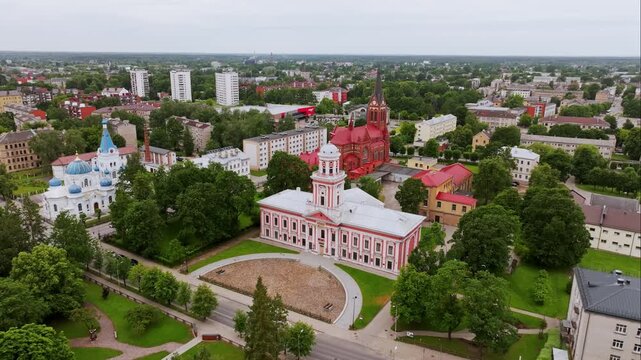 Cinematic shot of Jelgava Latvia showing museum churches and urban park