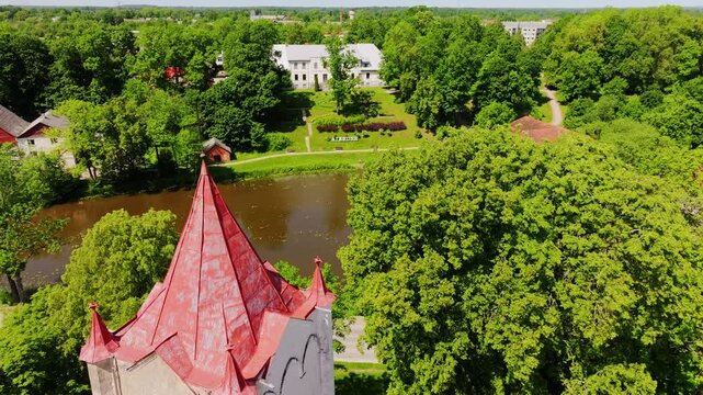 Aerial view of Aizpute St John Evangelical Lutheran Church and manor park