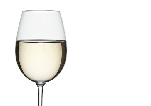 Elegant crystalware stemmed white wine glass, half-filled with pale golden wine, condensation, visible meniscus, isolated on transparent background, ample copy space. Concept for premium beverage
