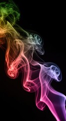 Obraz premium Dynamic colored smoke swirling on a black background creating a flowing, vibrant, and mystical abstract vapor pattern with high contrast effect, high, dark, colorful