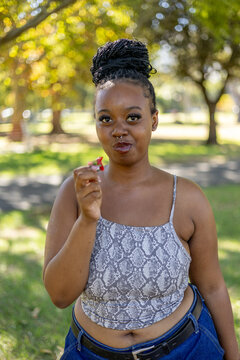 Young black female outside in a park
