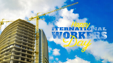 Naklejka premium Celebrating international workers day on May 1 at a construction site with blue sky