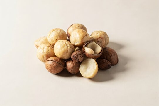 Nut assortment enriching culinary experiences showcasing the distinct textures and flavors of macadamia nuts featuring cracked shells and whole nuts arranged elegantly